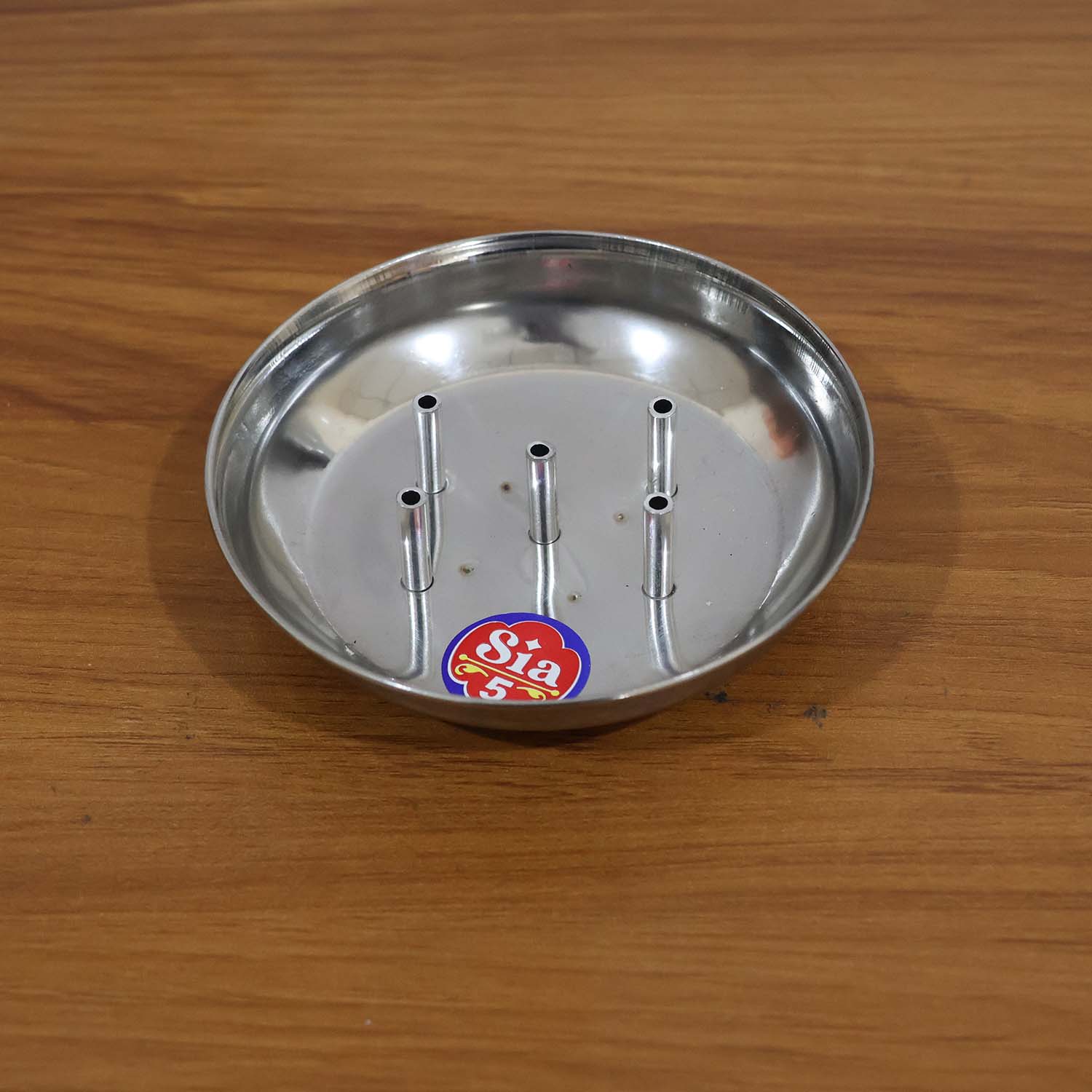Compact steel agarbatti holder