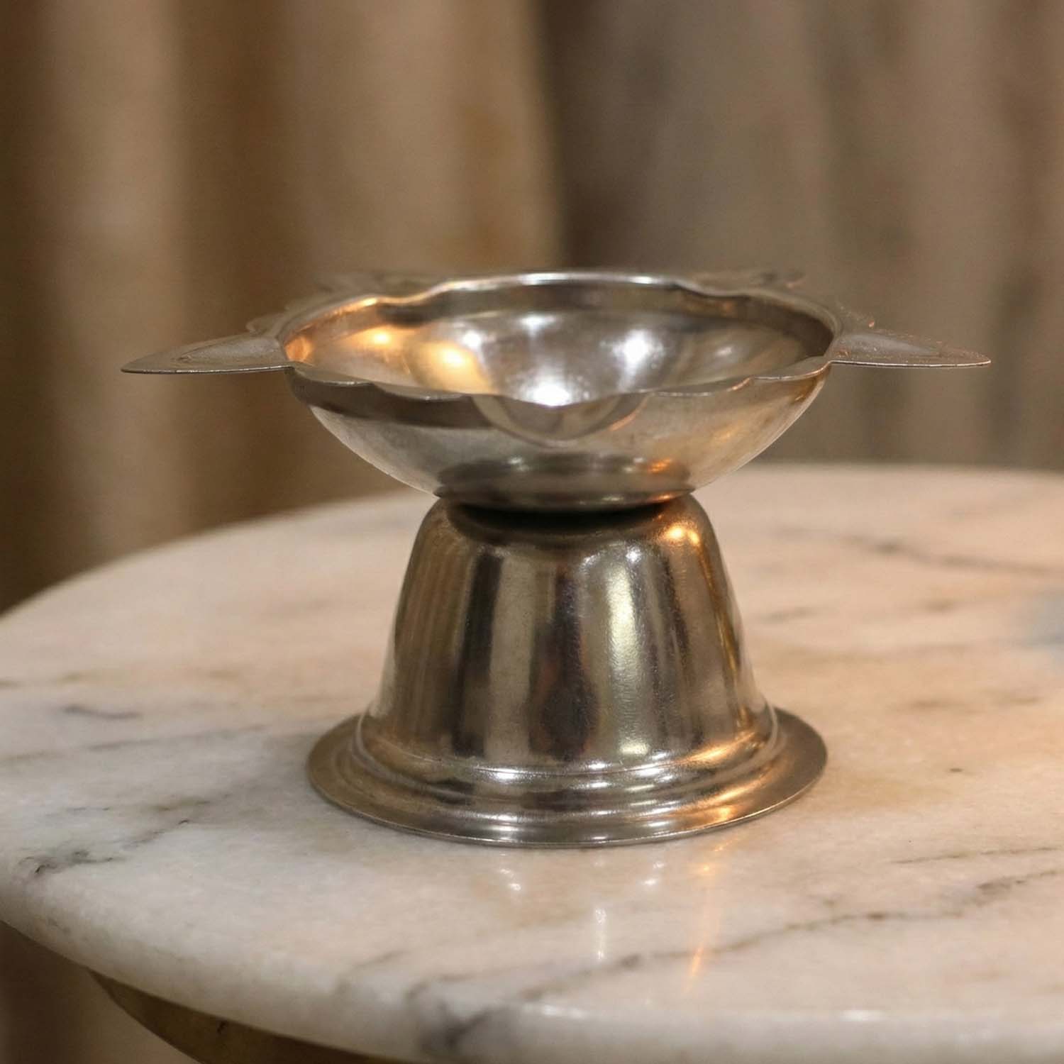 Polished metal diya stand