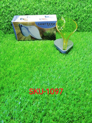 Leaf-shaped self-draining soap holder for bathrooms.